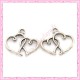 15 breloques coeur en métal argentées 2cm