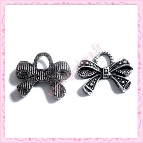  15 breloques noeud en métal argentées 1.9cm