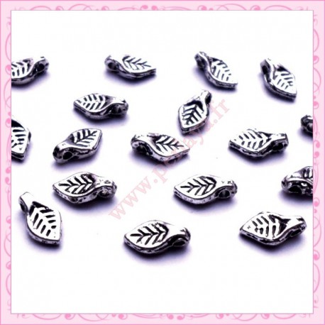 20 petites breloques feuilles d'arbres