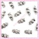  15 breloques bonbon en métal argentées 1.5cm