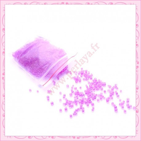 20g de micro-billes en verre transparente rose fushia 1.5mm