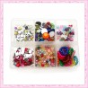 1 Boite contenant des petits embellissements